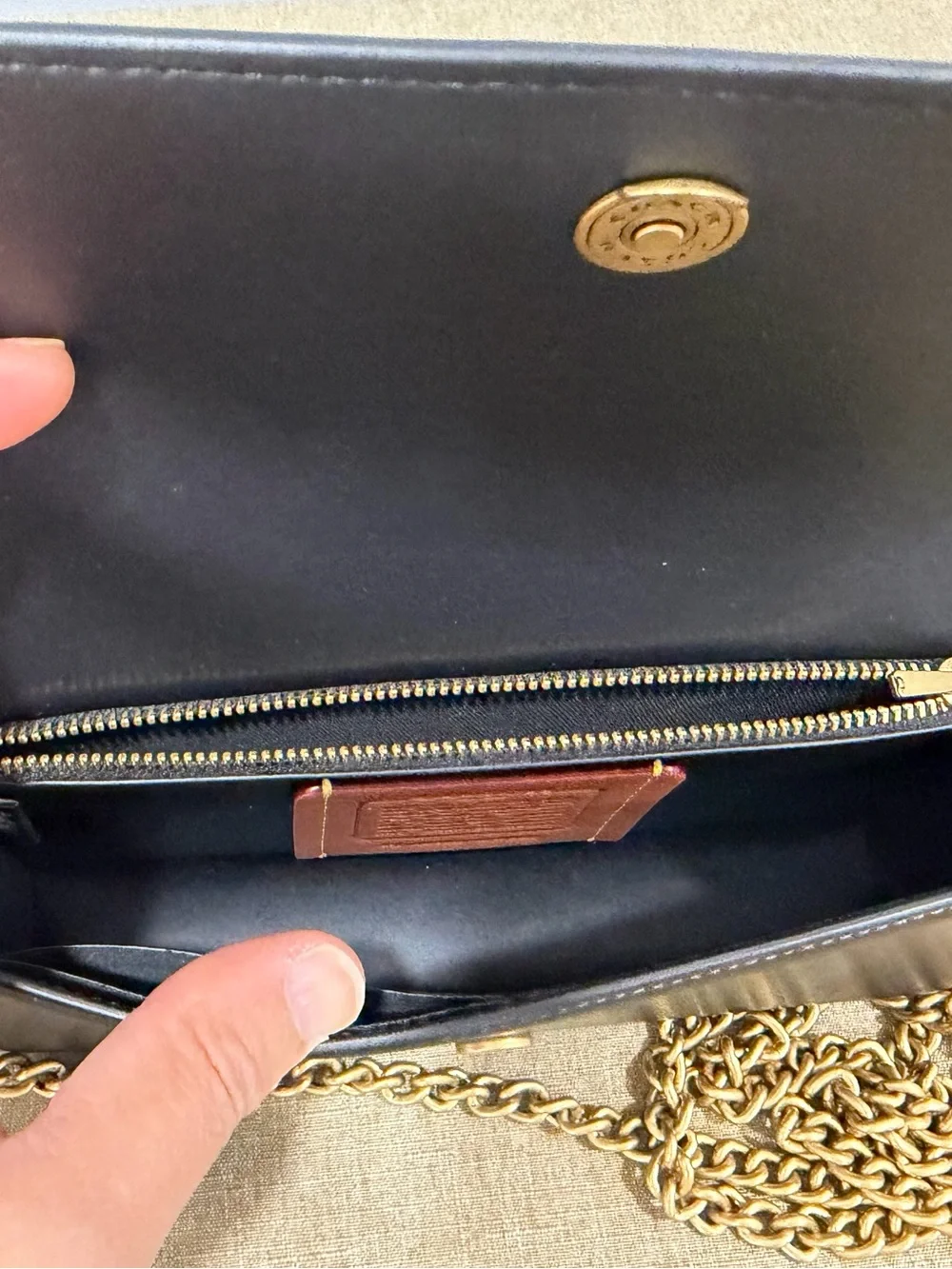 Coach sleek black